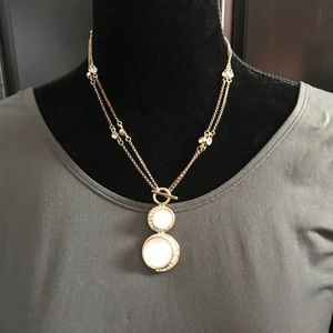 Convertible Gold and Pearl drop necklace.